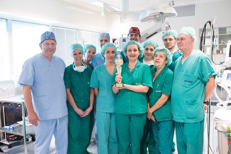 Surgeons and medical staff with ophthalmic Oscar.jpg