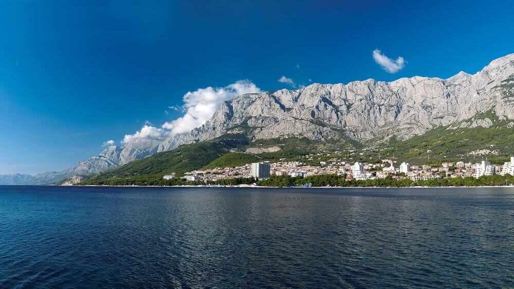Biokovo Mountain and Biokovo Nature Park with Makarska in the foreground. © Alan Čaplar / Croatian National Tourist Board.
