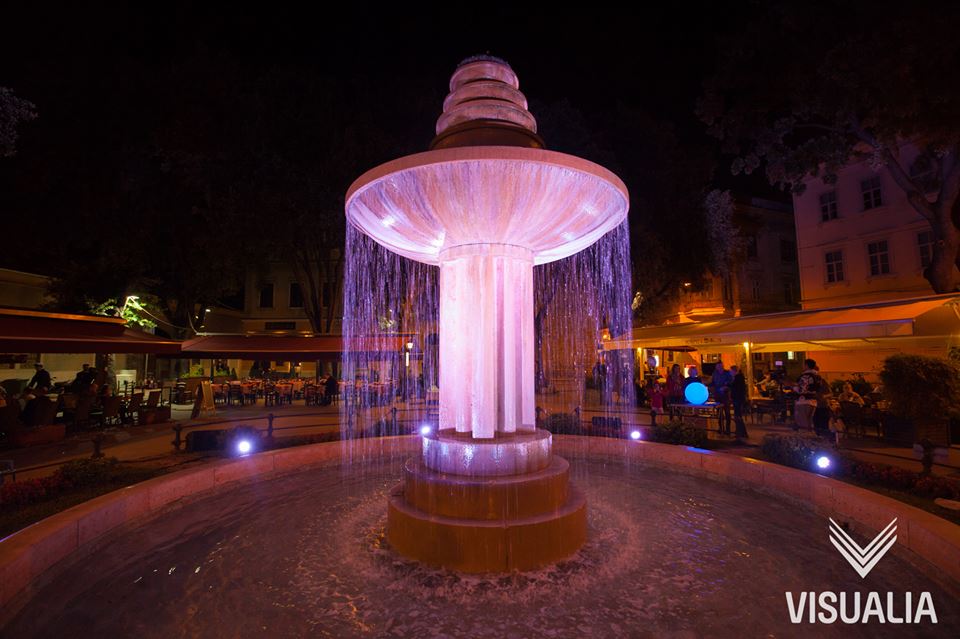 A city centre fountain, lit for Visualia Festival